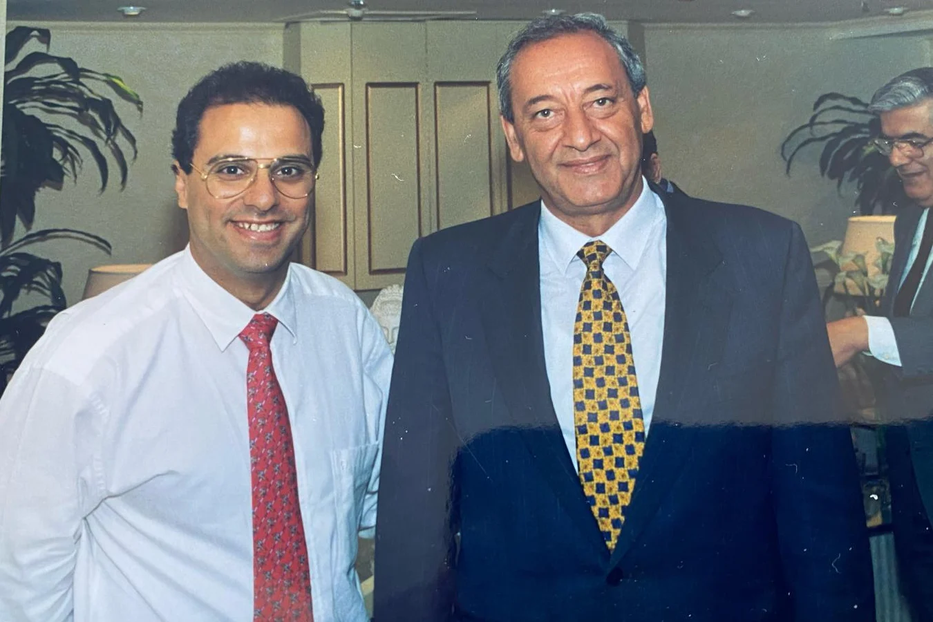 Michel Germani with a visiting dignitary at the Germani boutique