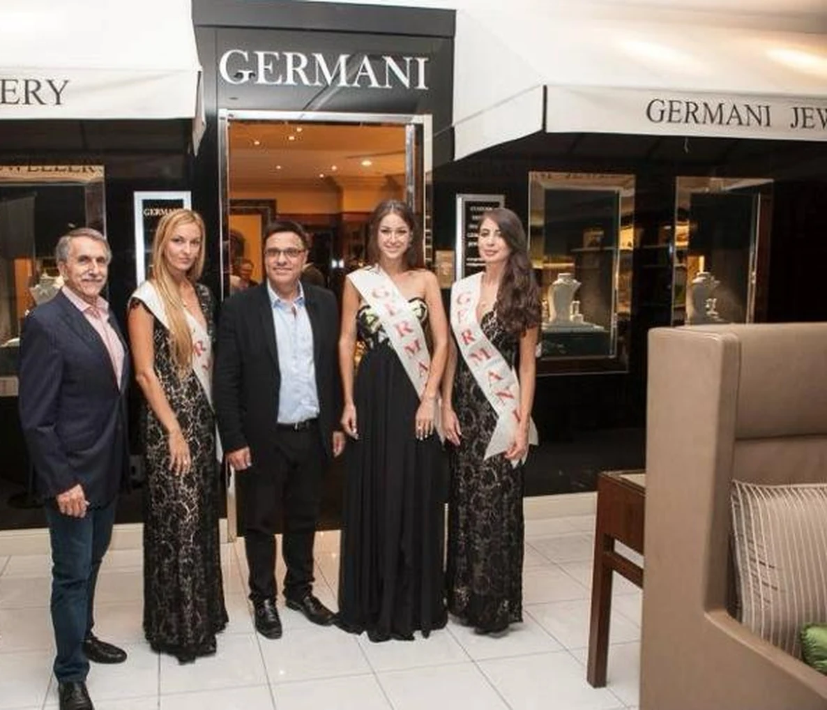 Michel Germani with guests at a Germani function outside the boutique