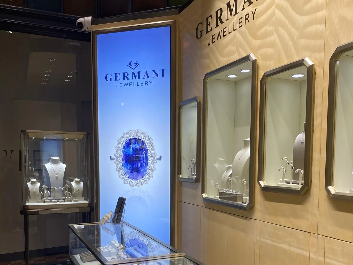 Inside the Germani store at the Queen Victoria Building, with gold-framed display windows
