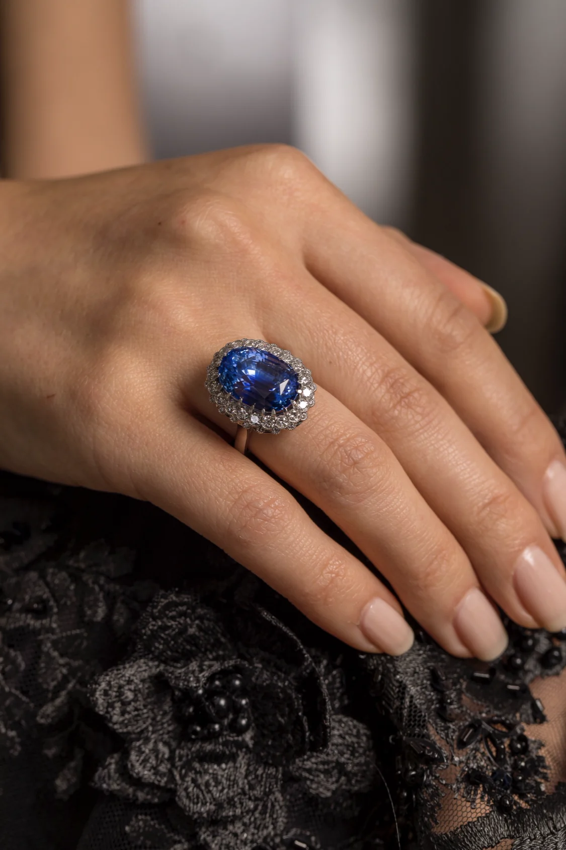 Oval sapphire and diamond ring, worn